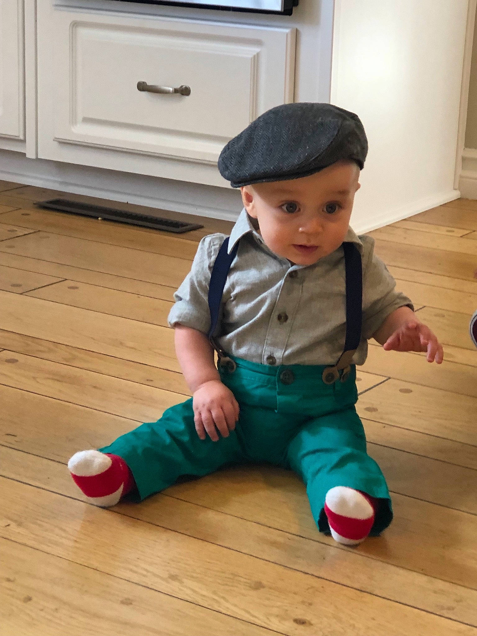 Sullivan is registered to the contest to win money with this photo: child, floor, flooring, footwear, infant, person, play, product, shoe, sitting, standing, toddler, toy