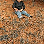 Legacy joined the competition — help win amazing prizes! child, toddler, curly_hair, sitting, outdoor, autumn, pine_needles, leaves, black_shirt, blue_jeans, nature, foliage, grass, tree, person, casual_clothing, daylight, ground_cover, seasonal, young_child
