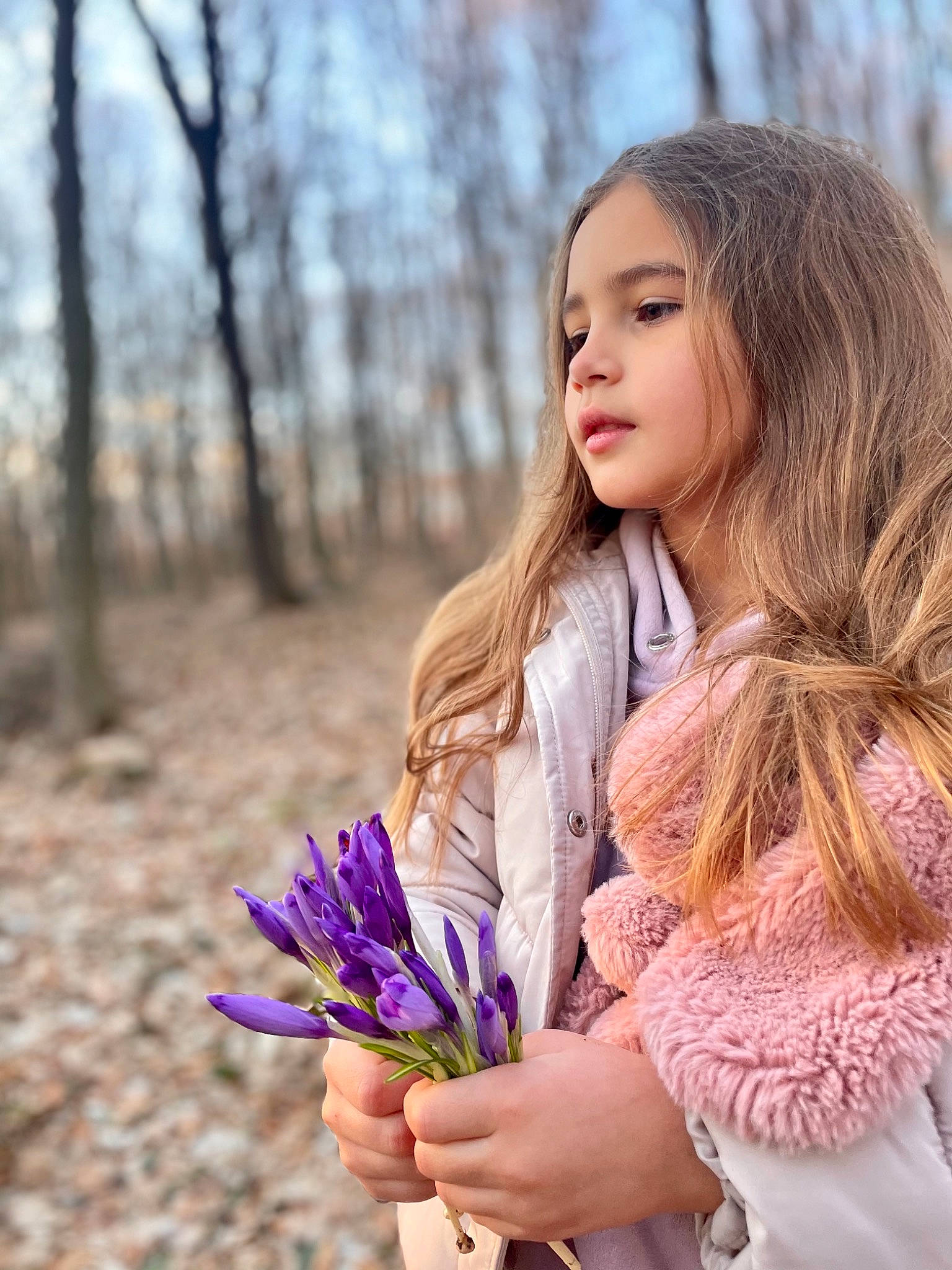 Anastasia participe au concours pour gagner de l'argent avec cette photo : beauty, blond, clothing, electric_blue, flower, grass, hairstyle, happy, iris, long_hair, outerwear, people_in_nature, person, petal, pink, plant, skin, street_fashion, tree, winter