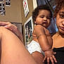 Akarii is registered to the contest to win money with this photo: arm, baby, casual, child, curious, curly_hair, diaper, expression, face, hand, holding, home, indoor, person, portrait, poster, skin, ultrasound_images, wall, woman