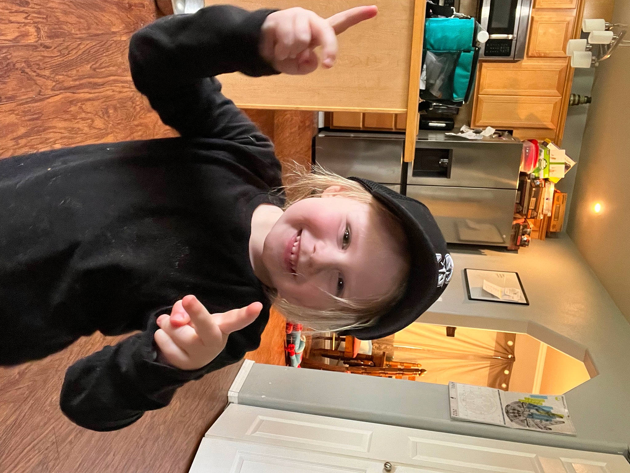 Kennedi joined the competition — help win amazing prizes! child, fun, gesture, headwear, joy, machine, person, room, service, smile, thumb, toddler
