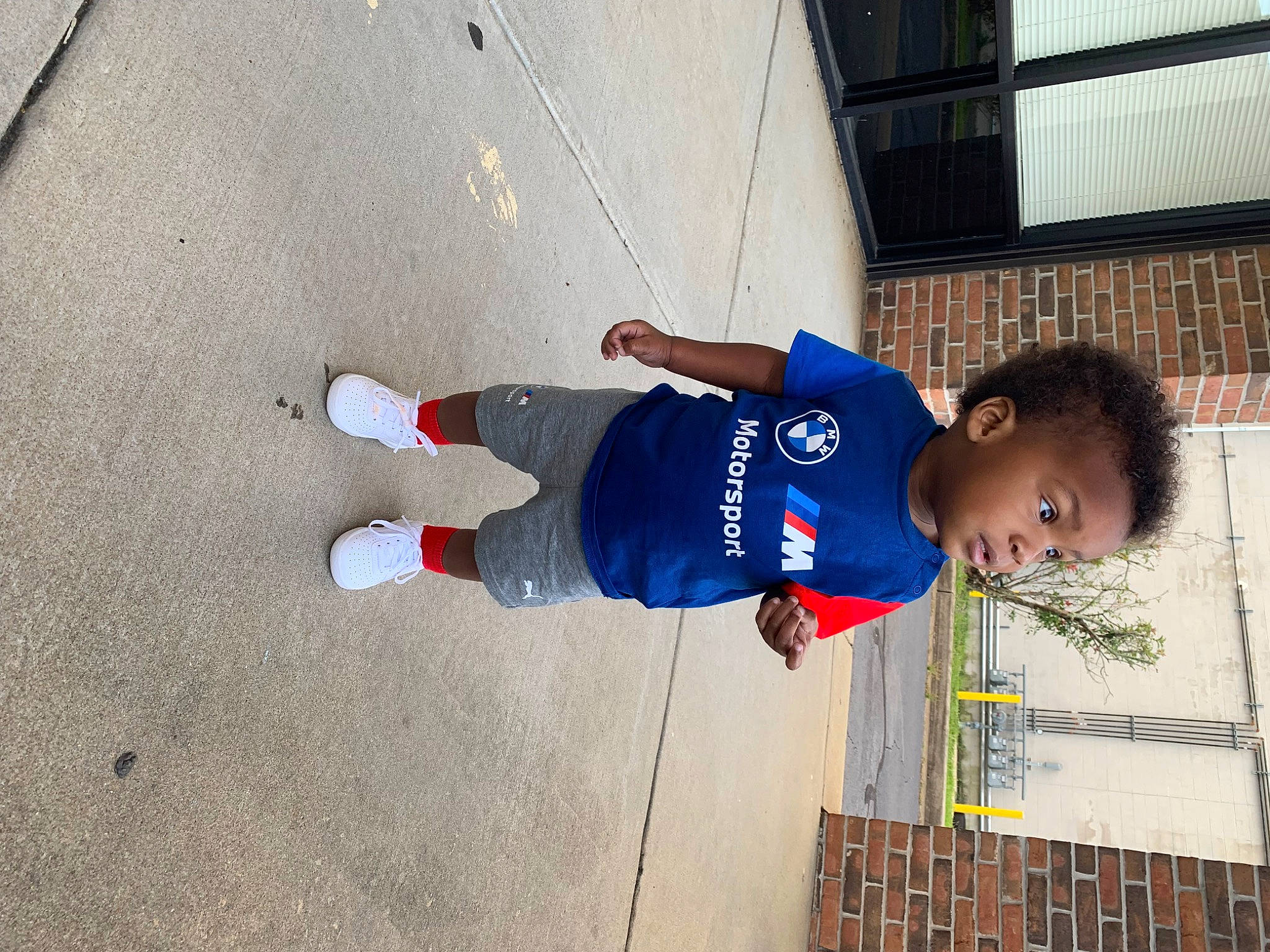 Prince joined the competition — help win amazing prizes! asphalt, carmine, child, composite_material, concrete, elbow, electric_blue, fun, hat, human_leg, leisure, outdoor_shoe, person, road_surface, shadow, t_shirt, toddler, walking_shoe