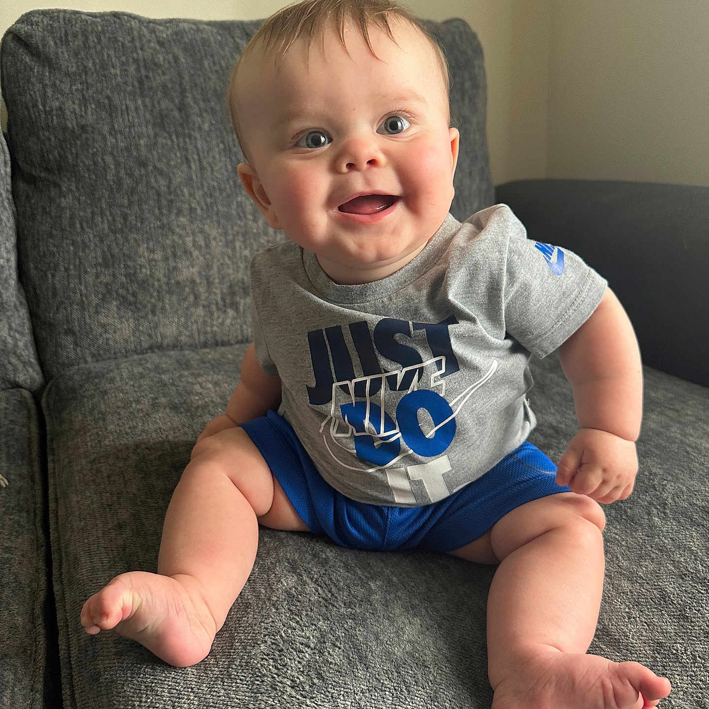 Michael joined the competition — help win amazing prizes! baby, bodypart, chair, clothing, couch, cushion, face, finger, furniture, hand, happy, head, homedecor, pants, person, photography, portrait, sitting, smile, t_shirt