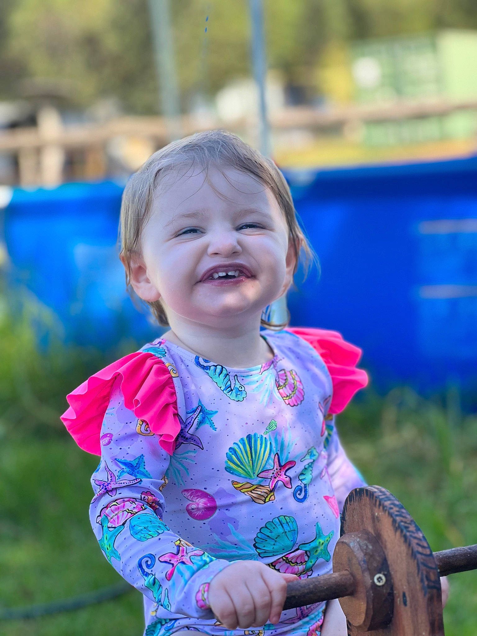 Malia is registered to the contest to win money with this photo: baby, baby_toddler_clothing, child, city, electric_blue, fun, grass, happy, joy, leisure, magenta, person, play, portrait_photography, recreation, sitting, skin, sleeve, smile, toddler