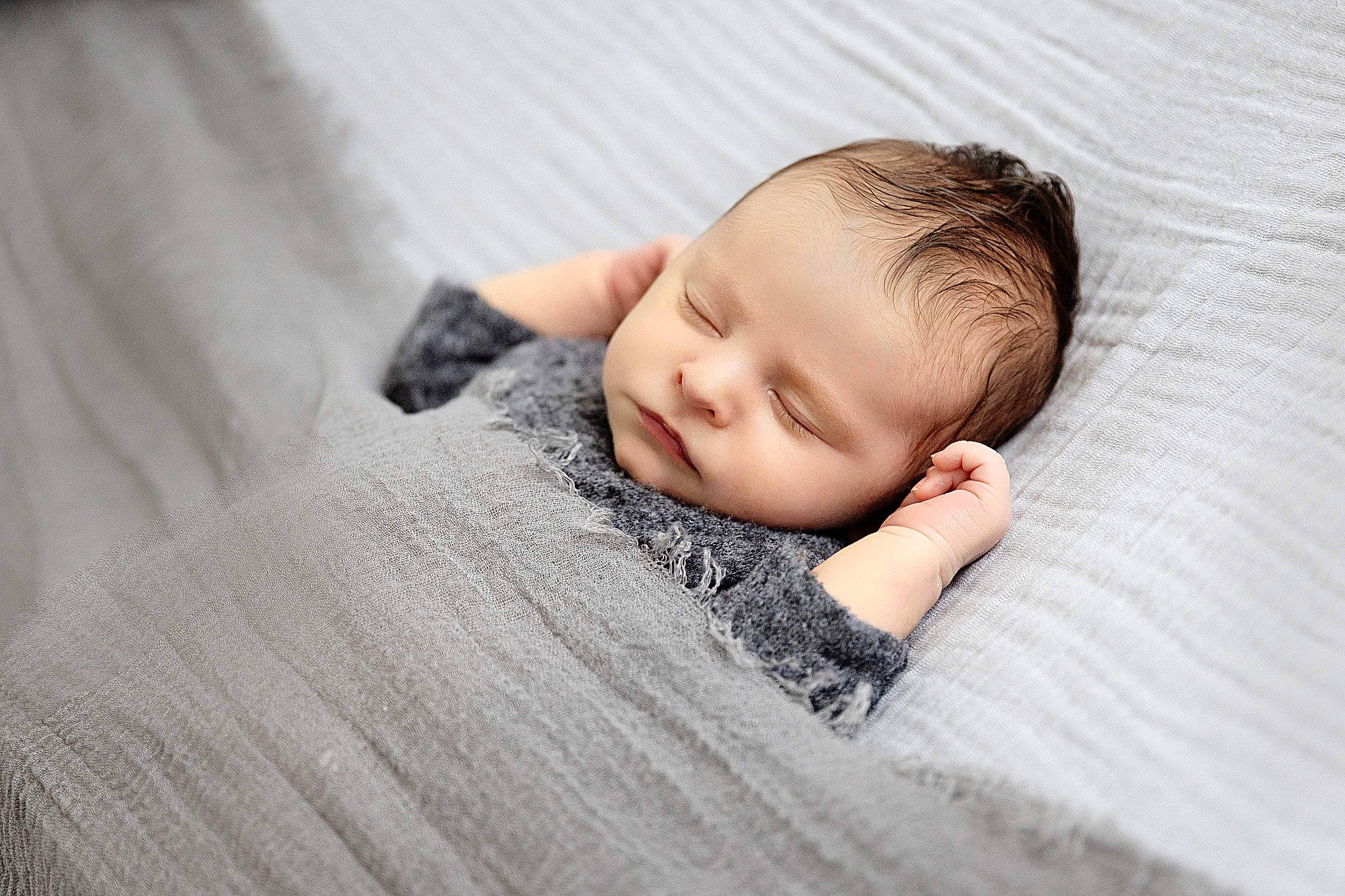 Ashton joined the competition — help win amazing prizes! baby, baby_toddler_clothing, child, comfort, flash_photography, flooring, fur, grey, linens, pattern, person, photo_shoot, portrait_photography, sitting, skin, toddler, wood