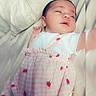 Melliana joined the competition — help win amazing prizes! baby, sleeping, infant, pink_dress, strawberry_pattern, blanket, soft, cute, child, portrait, resting, peaceful, indoors, closeup, white_background, clothing, adorable, newborn, love_text, blur_effect