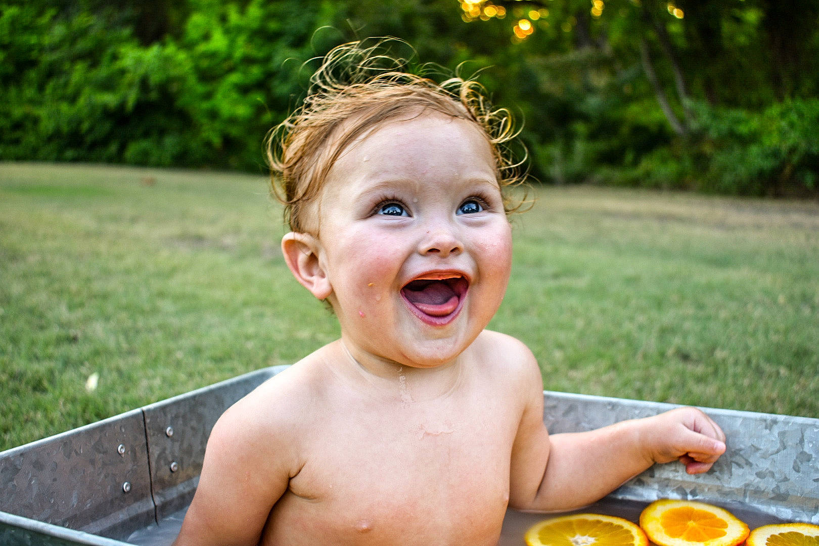 Viktoria is registered to the contest to win money with this photo: child, face, facial_expression, fun, grass, happy, laugh, leisure, mouth, nose, person, plant, play, smile, summer, toddler, vacation, water