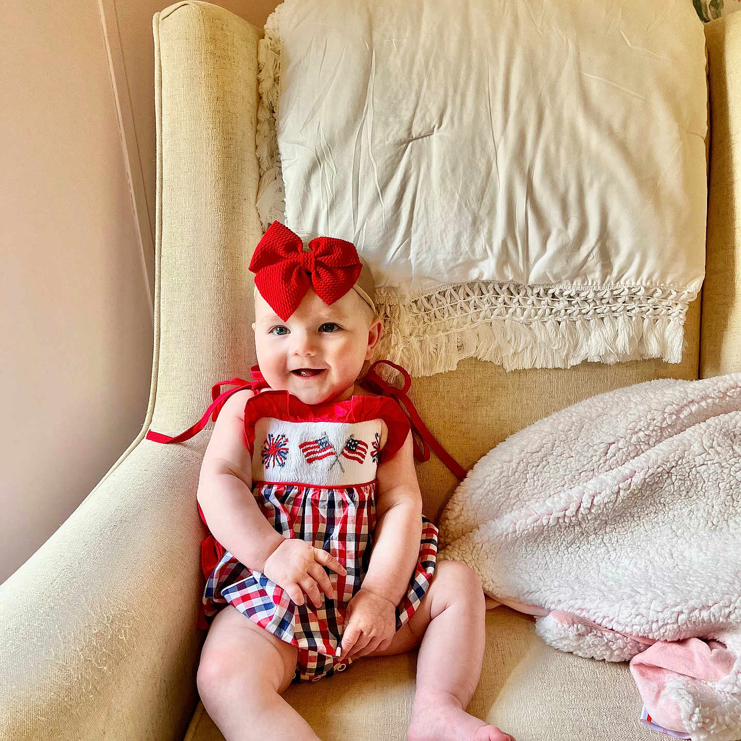Tatum is registered to the contest to win money with this photo: armchair, baby, blanket, chair, chaise, clothing, cushion, face, furniture, hair, head, homedecor, person, photography, pillow, portrait, sitting, sleeve