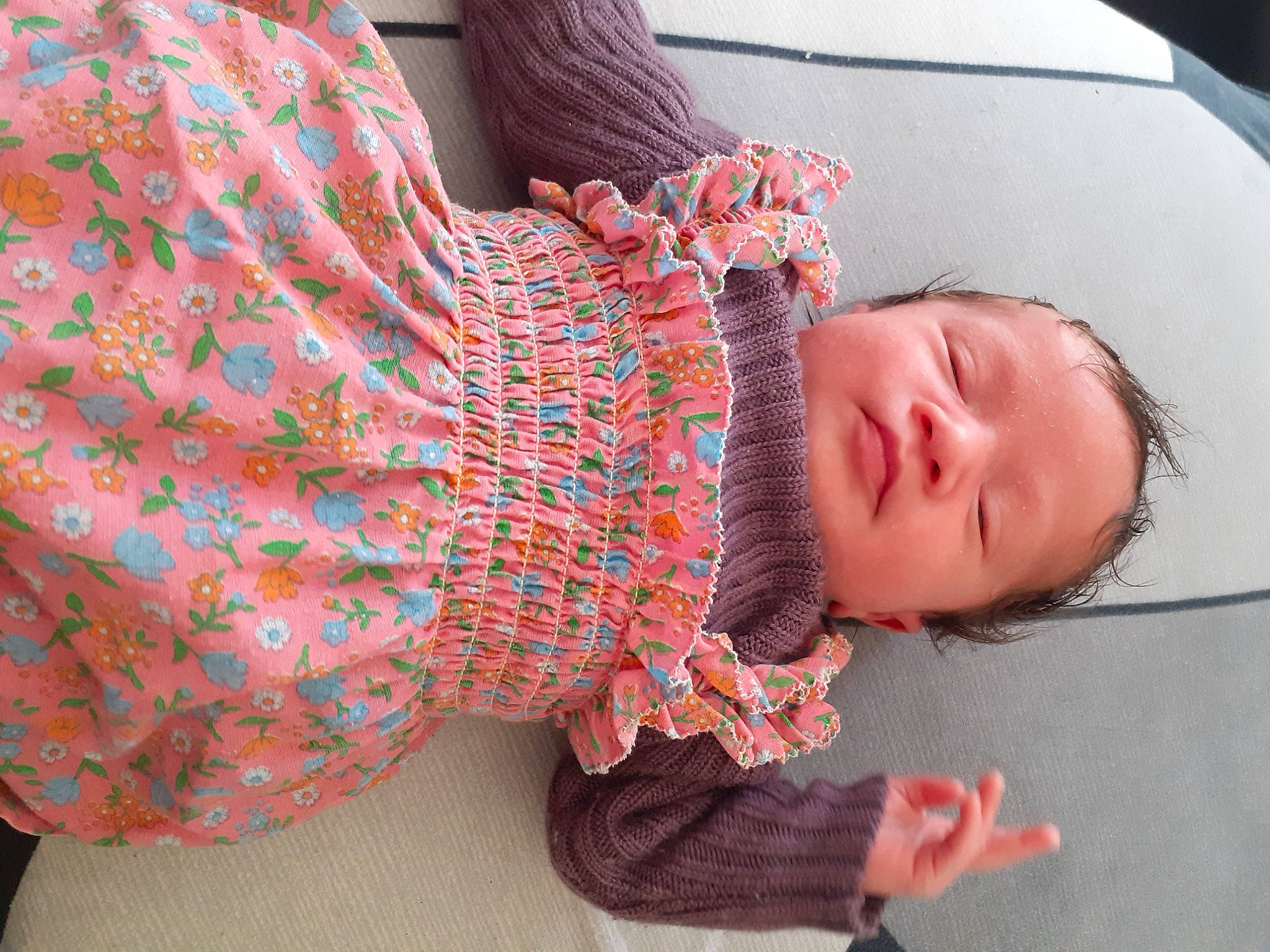 Layanna participe au concours pour gagner de l'argent avec cette photo : baby, baby_products, baby_sleeping, baby_toddler_clothing, child, comfort, finger, joint, linens, magenta, mammal, nail, pattern, person, skin, sleeve, thread, toddler, vertebrate, wool