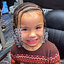 braid, child, clothing, cornrows, face, female, girl, hair, head, knitwear, person, sweater