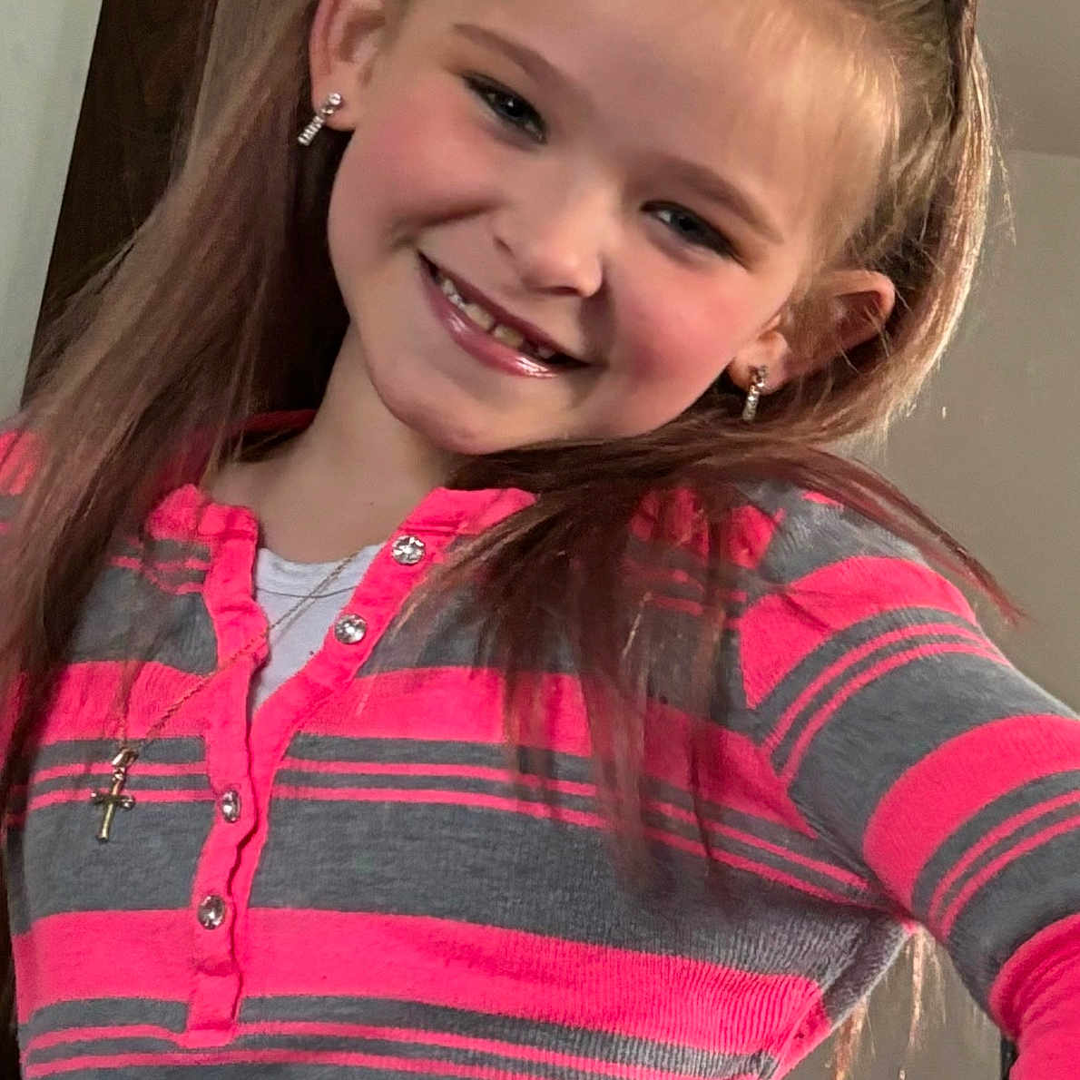 Serenity is registered to the contest to win money with this photo: accessories, blouse, bodypart, brownhair, child, clothing, dimples, earring, face, female, girl, hair, happy, head, jewelry, person, photography, portrait, sleeve, smile