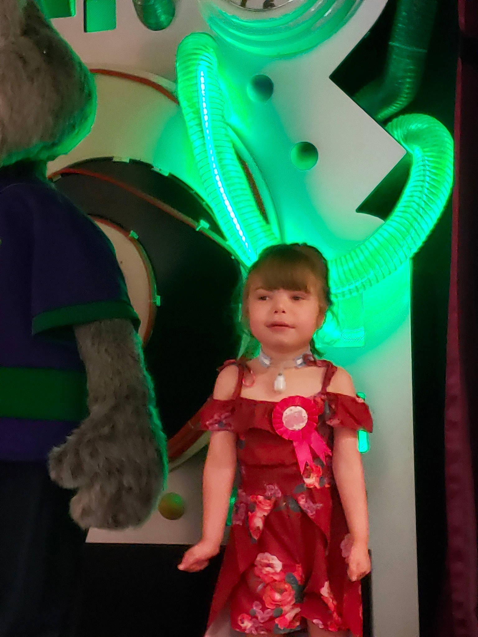 Sunny is registered to the contest to win money with this photo: child, costume, fashion, fictional_character, fun, green, head, party, performance, person, skin, smile, toddler, vacation, world