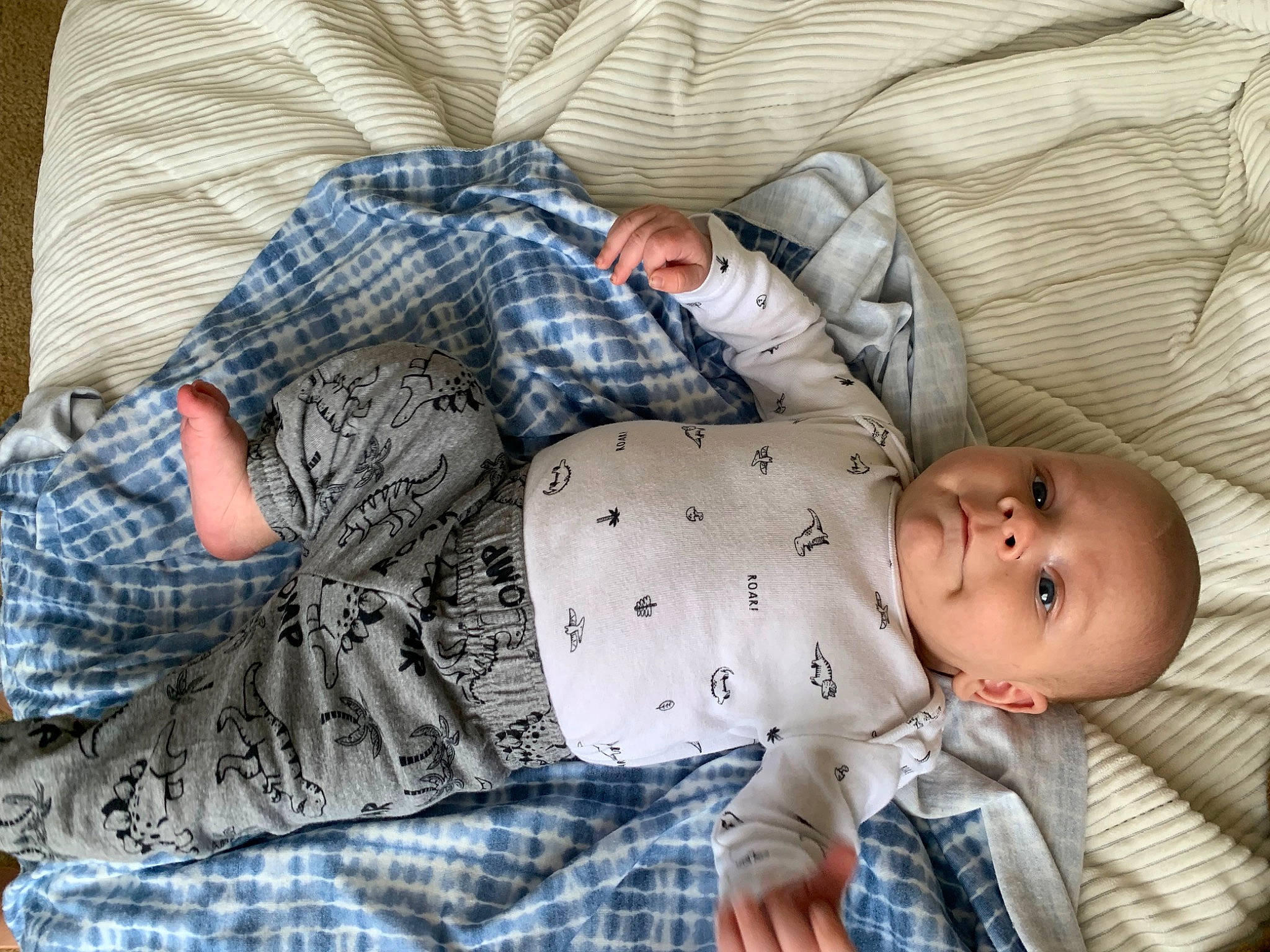 Nolan is registered to the contest to win money with this photo: baby, baby_toddler_clothing, bedtime, child, comfort, human_leg, linens, nap, pattern, people, person, plaid, room, sitting, sleep, sleeve, tartan, textile, thigh, toddler