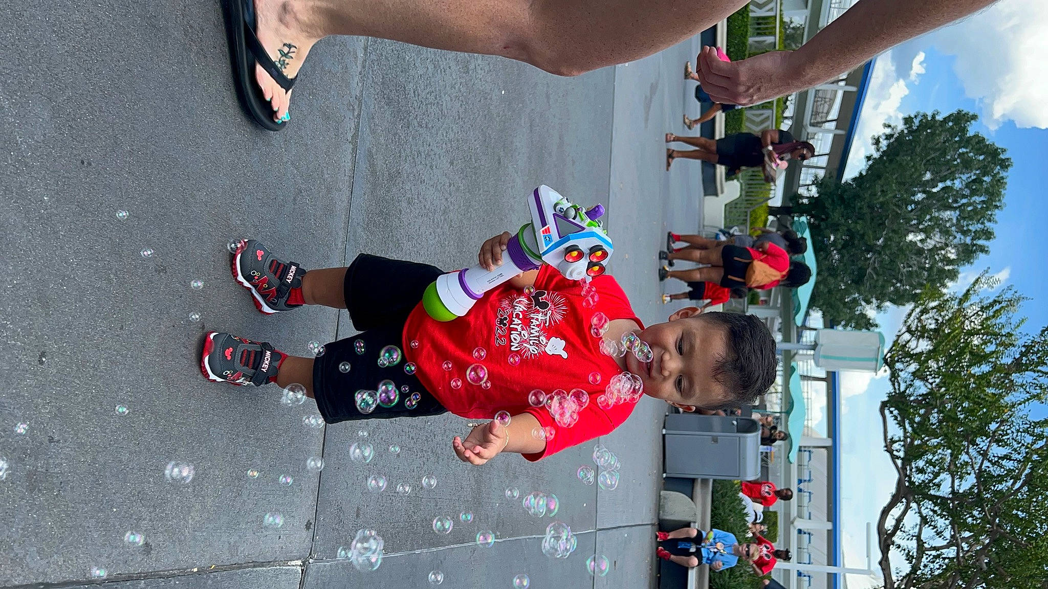 Sebastian joined the competition — help win amazing prizes! arm, event, foot, fun, green, human_leg, leg, leisure, marathon, person, pink, plant, recreation, red, shoe, shorts, snapshot, sneakers, street, tree