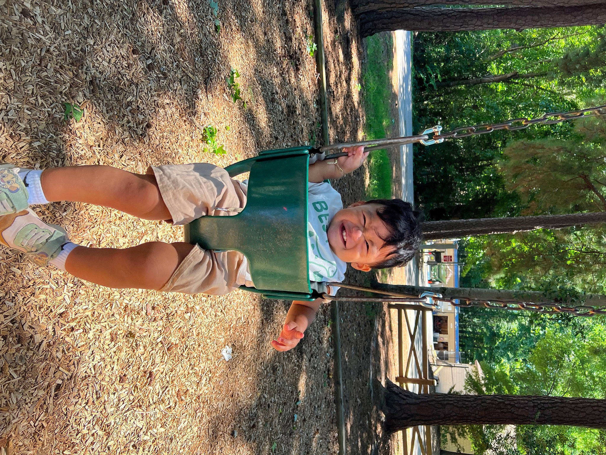 Sebastian is registered to the contest to win money with this photo: calf, fun, grass, happy, human_leg, landscape, leisure, people_in_nature, person, plant, soil, sorrow, thigh, tree, vacation, waist, wood