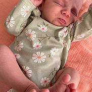 Penelope joined the competition — help win amazing prizes! baby, newborn, sleeping, onesie, floral_pattern, feet, hand, infant, skin, closeup, peaceful, pink, coral, blanket, cute, child, portrait, soft, resting, relaxed
