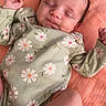 Penelope joined the competition — help win amazing prizes! baby, sleeping, infant, onesie, floral_pattern, blanket, peaceful, cute, skin, hand, foot, newborn, portrait, soft_texture, child, resting, closeup, indoors, face, peace