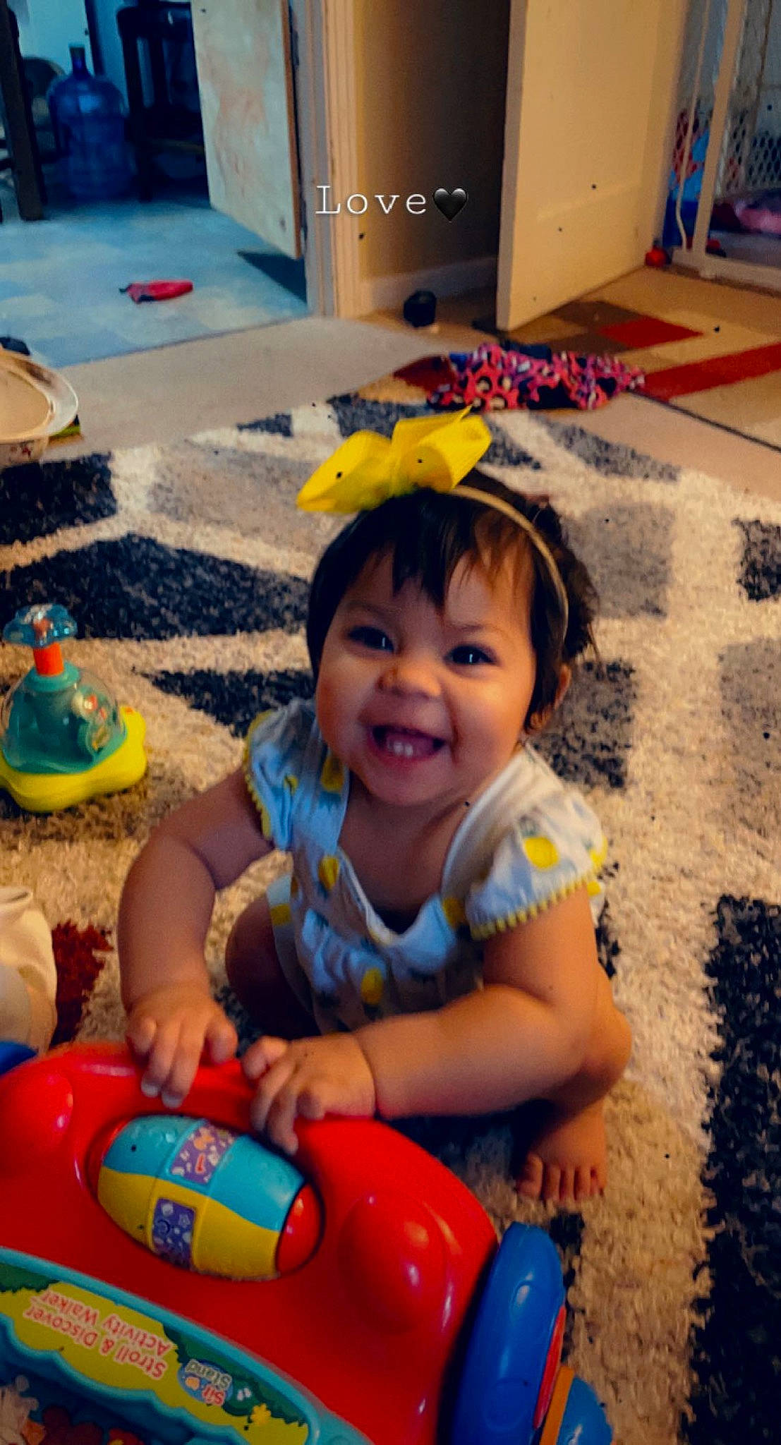 Vanellope joined the competition — help win amazing prizes! baby_toddler_clothing, blue, child, facial_expression, flooring, fun, happy, leisure, organ, people, person, photograph, product, public_space, smile, snapshot, summer, tire, toddler, toy