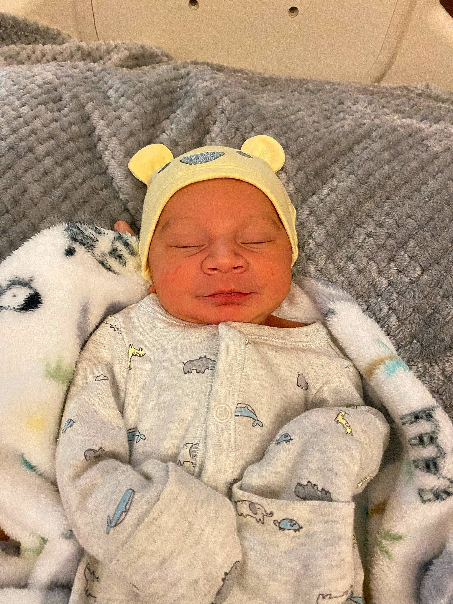 Manuel Elias joined the competition — help win amazing prizes! baby, baby_toddler_clothing, cap, cheek, child, comfort, eye, face, facial_expression, gesture, happy, headgear, headwear, linens, military_camouflage, person, skin, sleeve, smile, textile