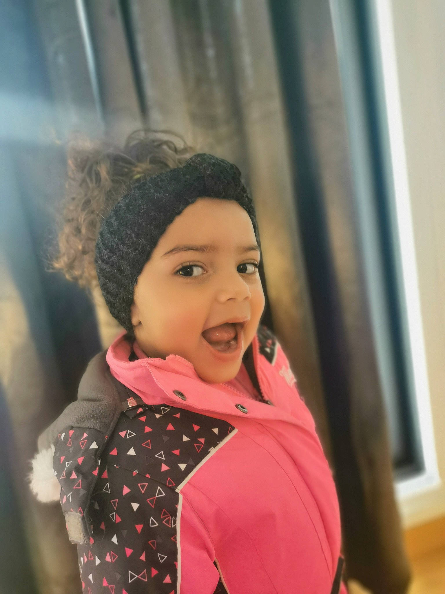 Giuliana participe au concours pour gagner de l'argent avec cette photo : beanie, black_hair, cap, child, event, fashion_accessory, fashion_design, fun, fur, happy, hat, headwear, jacket, lip, magenta, outerwear, person, portrait_photography, sleeve, smile