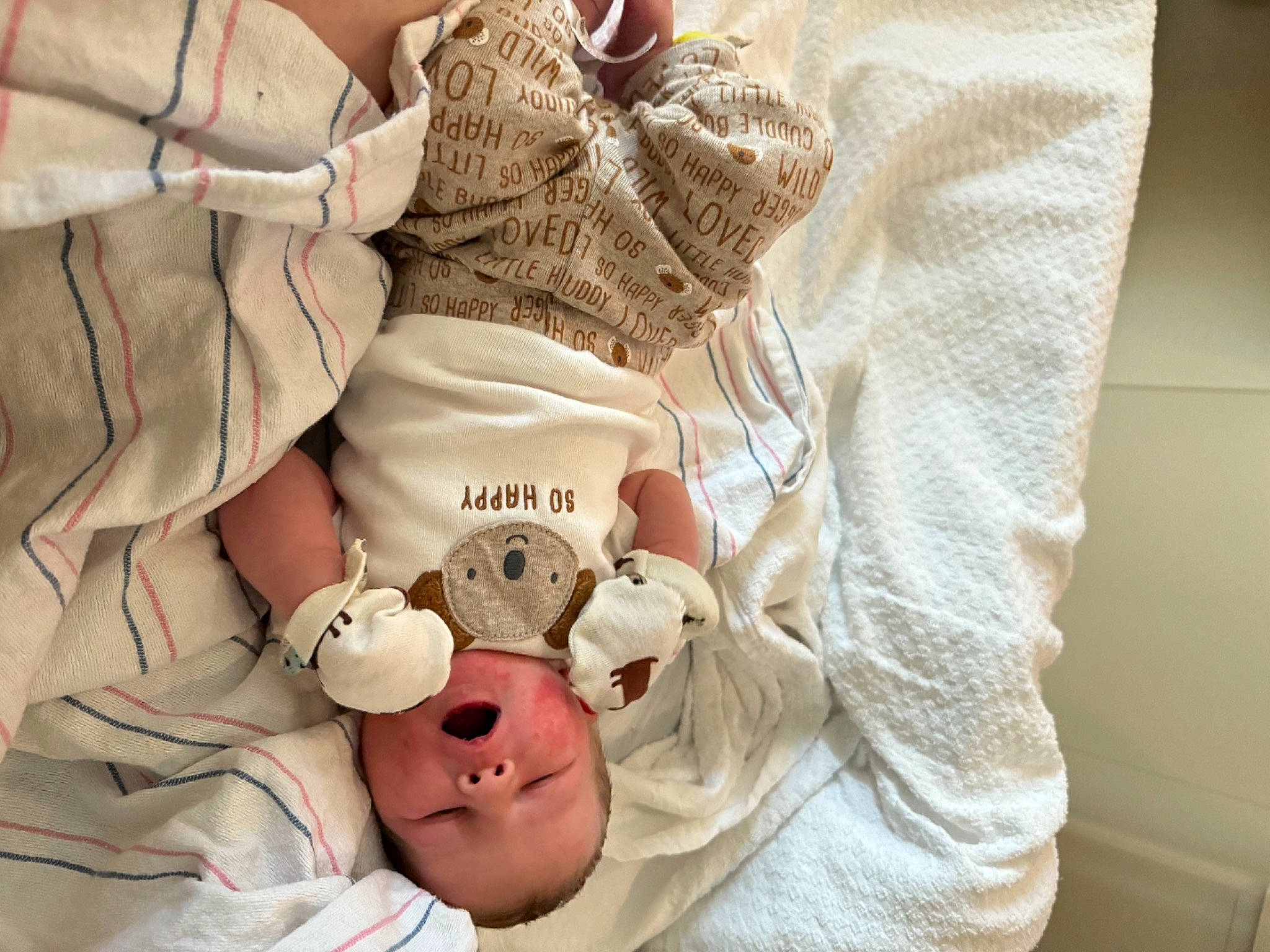 Declan joined the competition — help win amazing prizes! baby, baby_products, baby_sleeping, baby_toddler_clothing, bedding, child, comfort, human_leg, linens, pattern, peach, person, pink, room, sleeve, stuffed_toy, t_shirt, teddy_bear, textile, toddler