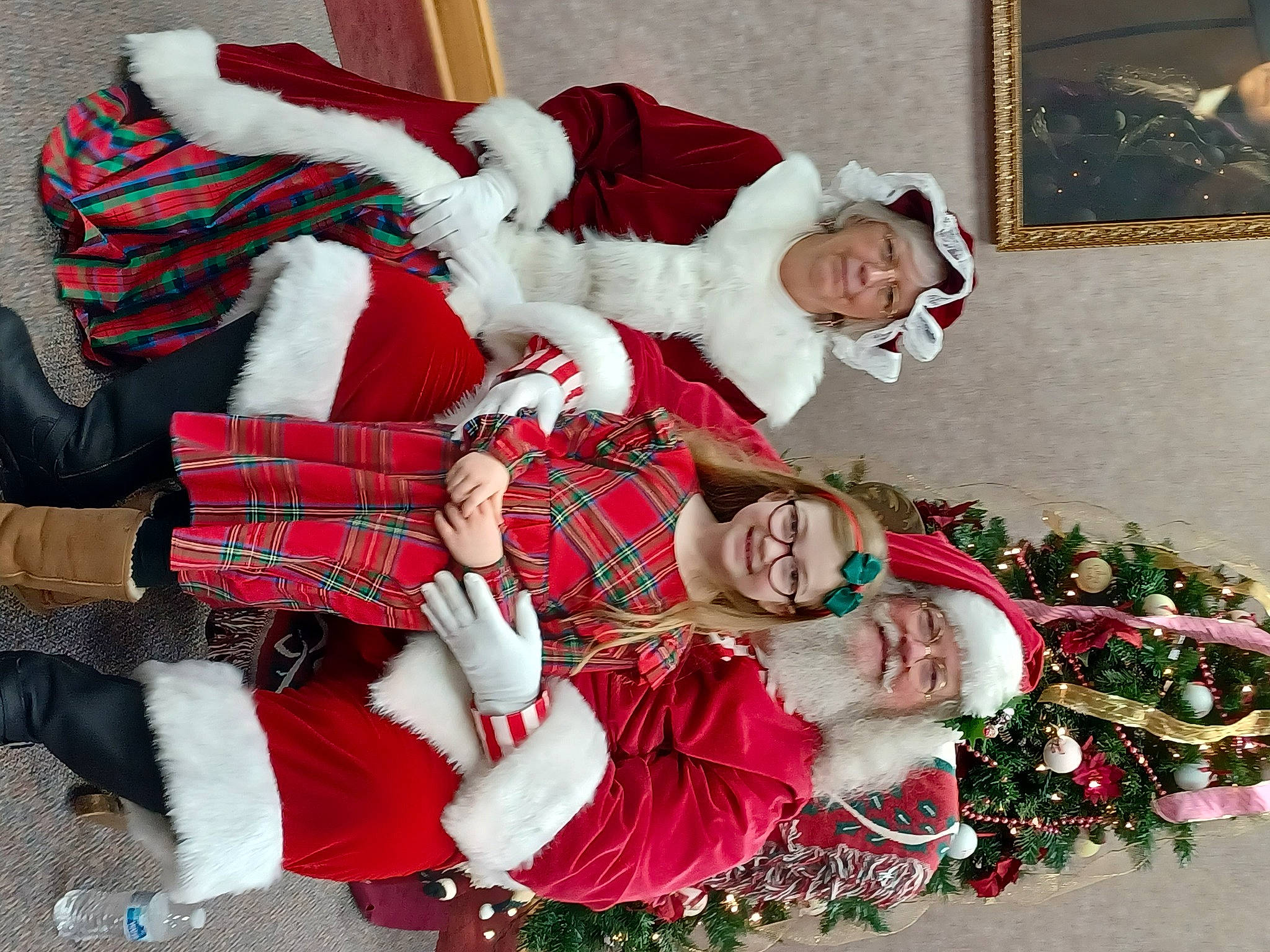 Sophia Iris joined the competition — help win amazing prizes! carmine, christmas, christmas_eve, christmas_ornament, event, fictional_character, fun, happy, headwear, holiday, joy, lap, pattern, person, picture_frame, plaid, plant, red, santa_claus, smile