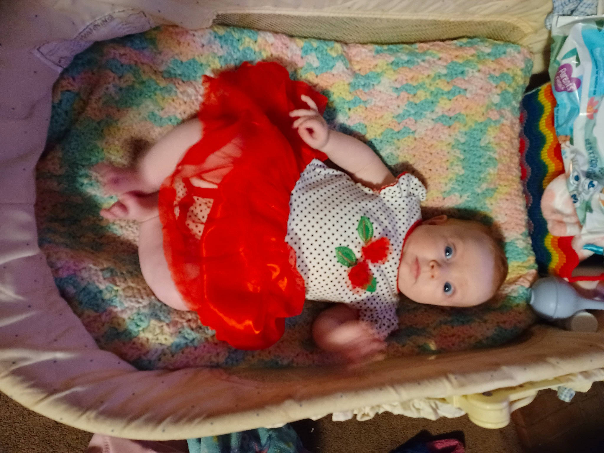 Sara is registered to the contest to win money with this photo: baby, baby_products, baby_toddler_clothing, child, circle, comfort, couch, fashion_accessory, head, headgear, linens, pattern, person, room, toddler, wood