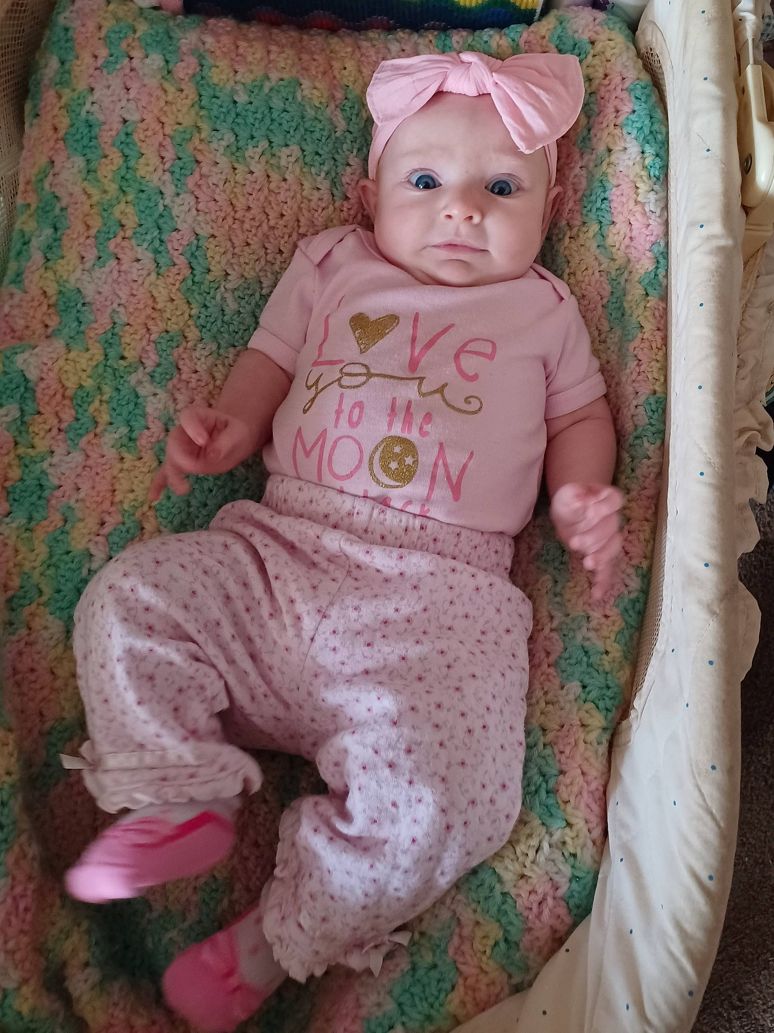 Sara joined the competition — help win amazing prizes! baby, baby_products, baby_toddler_clothing, baby_toys, chair, cheek, child, doll, eyelash, headwear, linens, magenta, pattern, peach, person, pink, sitting, sleeve, toddler, toy