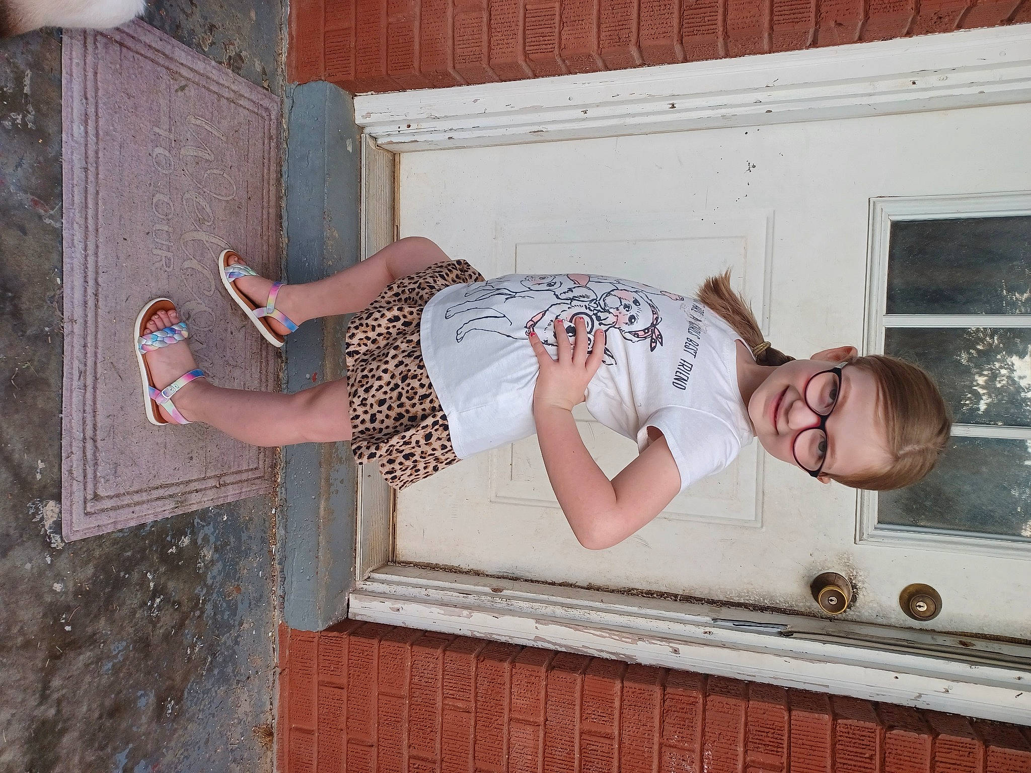 Sophia joined the competition — help win amazing prizes! brick, dress, elbow, eyewear, fun, glasses, human_leg, joy, knee, leg, pattern, person, shoulder, standing, sunglasses, textile, thigh, trunk, waist, window