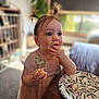 toddler, child, cake, frosting, sprinkles, pigtails, pink_dress, table, plate, indoor, eating, messy, happy, portrait, face, hands, food, cute, celebration, home
