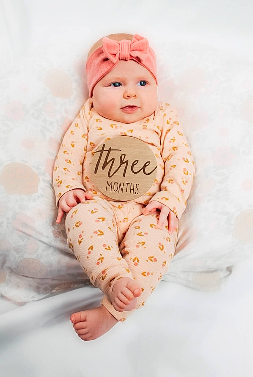 Mylah joined the competition — help win amazing prizes! baby, baby_products, baby_sleeping, baby_toddler_clothing, beanie, cap, child, collar, comfort, eye, face, fashion_accessory, font, fur, headwear, linens, peach, person, sitting, sleeve