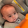 Jr. joined the competition — help win amazing prizes! baby, car_seat, child, child_safety, closeup, clothing, curious, expression, eyes, face, head, indoors, infant, orange, portrait, safety, seatbelt, striped_shirt, toy, young