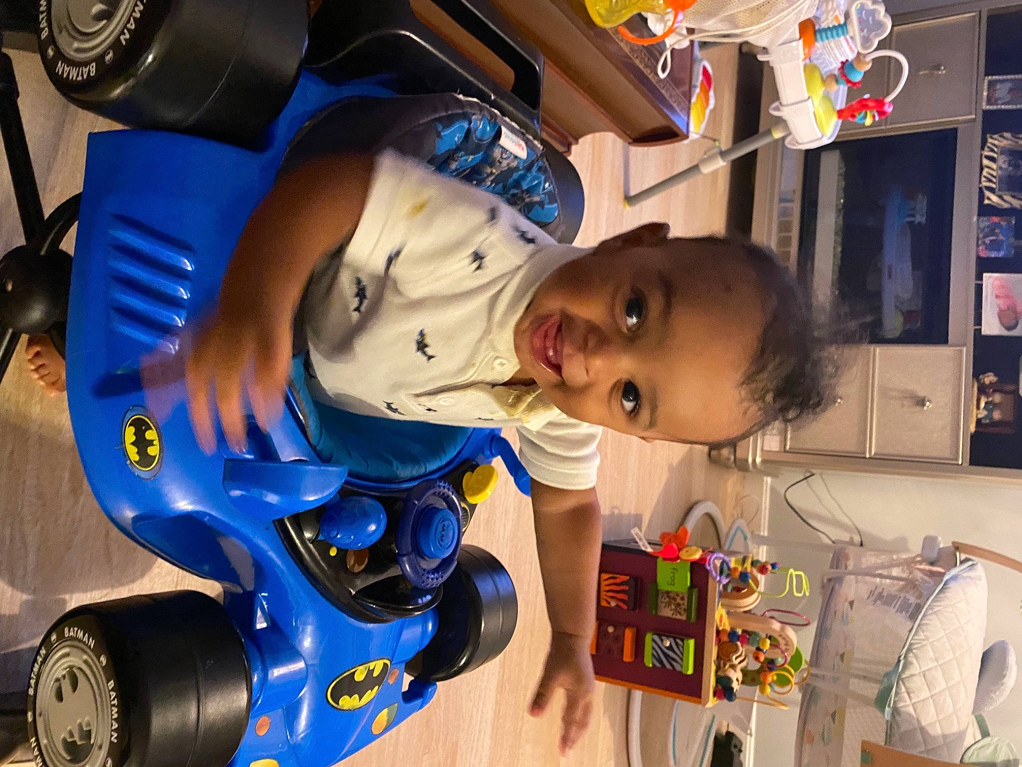 Judah is registered to the contest to win money with this photo: automotive_design, automotive_exterior, automotive_tire, baby, blue, bumper, child, cool, electric_blue, fun, motor_vehicle, people, person, product, smile, space, tire, toddler, toy, vehicle_door