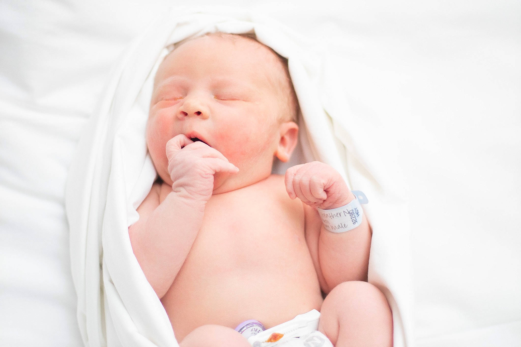 Caleb is registered to the contest to win money with this photo: abdomen, baby, baby_products, baby_sleeping, baby_toddler_clothing, cheek, child, comfort, flesh, foot, hand, happy, human_leg, nail, person, portrait_photography, sitting, skin, stomach, thumb