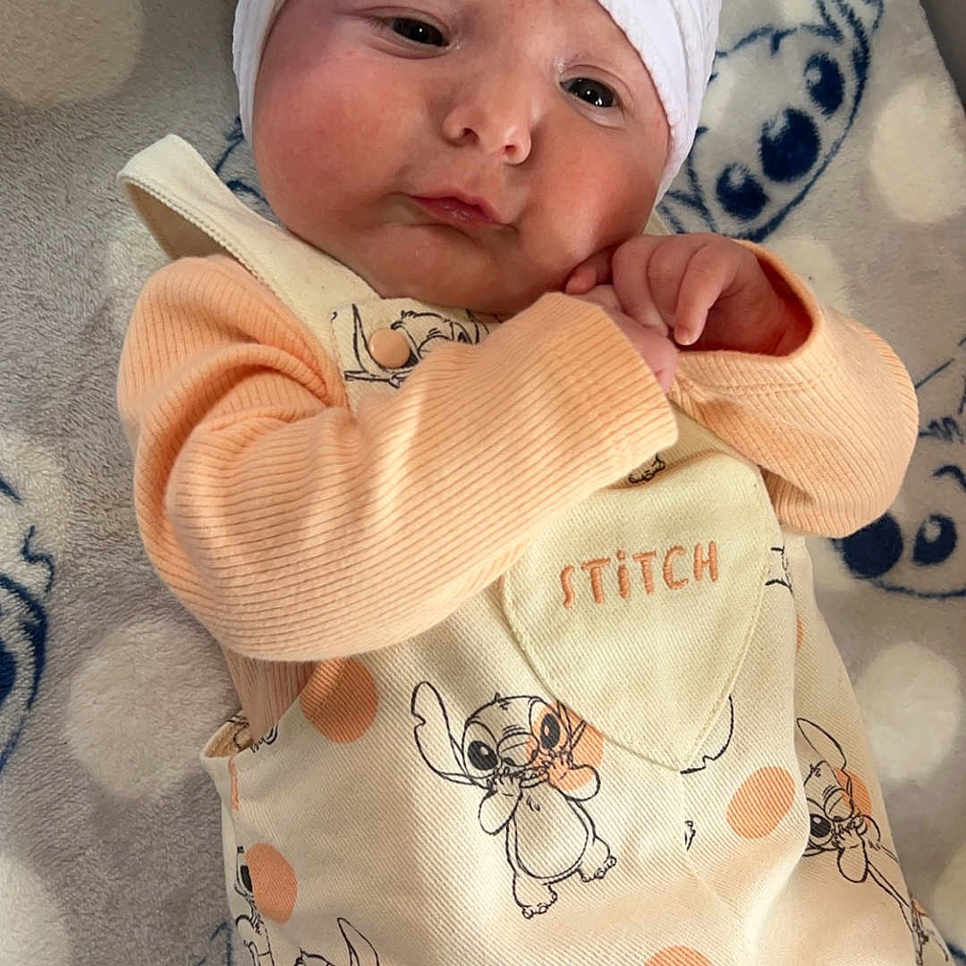 Daisy-Mae Burgess joined the competition — help win amazing prizes! baby, bed, blanket, bodypart, bonnet, cap, clothing, face, finger, furniture, hand, hat, head, homedecor, newborn, person, photography, portrait, quilt, sleeping