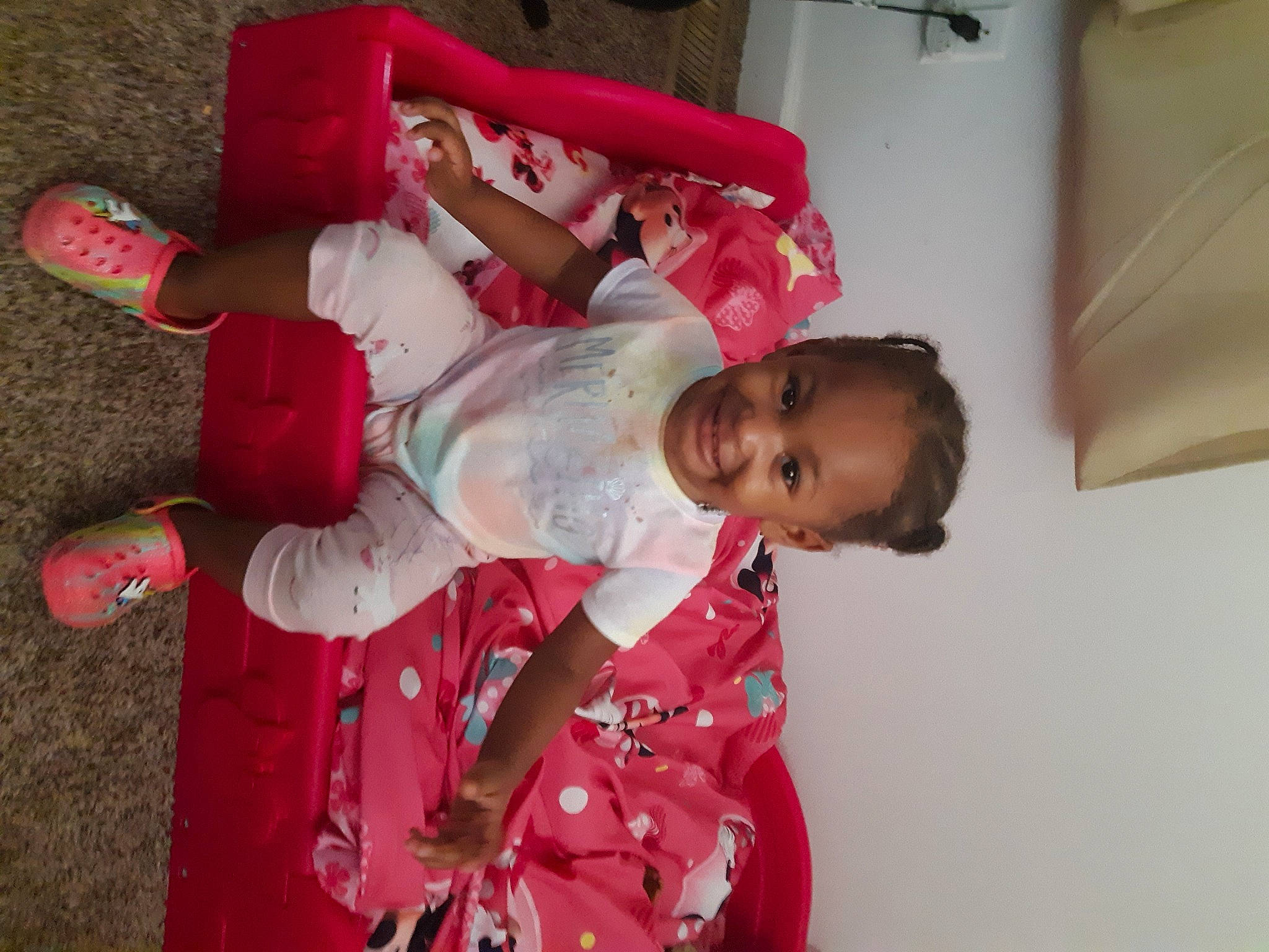 Tiana is registered to the contest to win money with this photo: child, joy, person, red, toddler