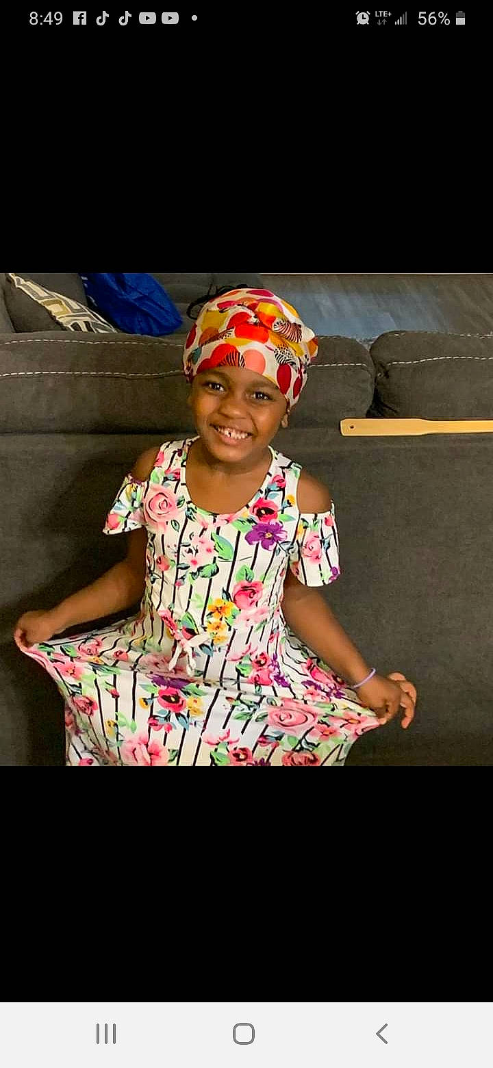 Cassidy is registered to the contest to win money with this photo: arm, cap, child, fun, hair_accessory, headgear, headwear, joy, person, smile, toddler