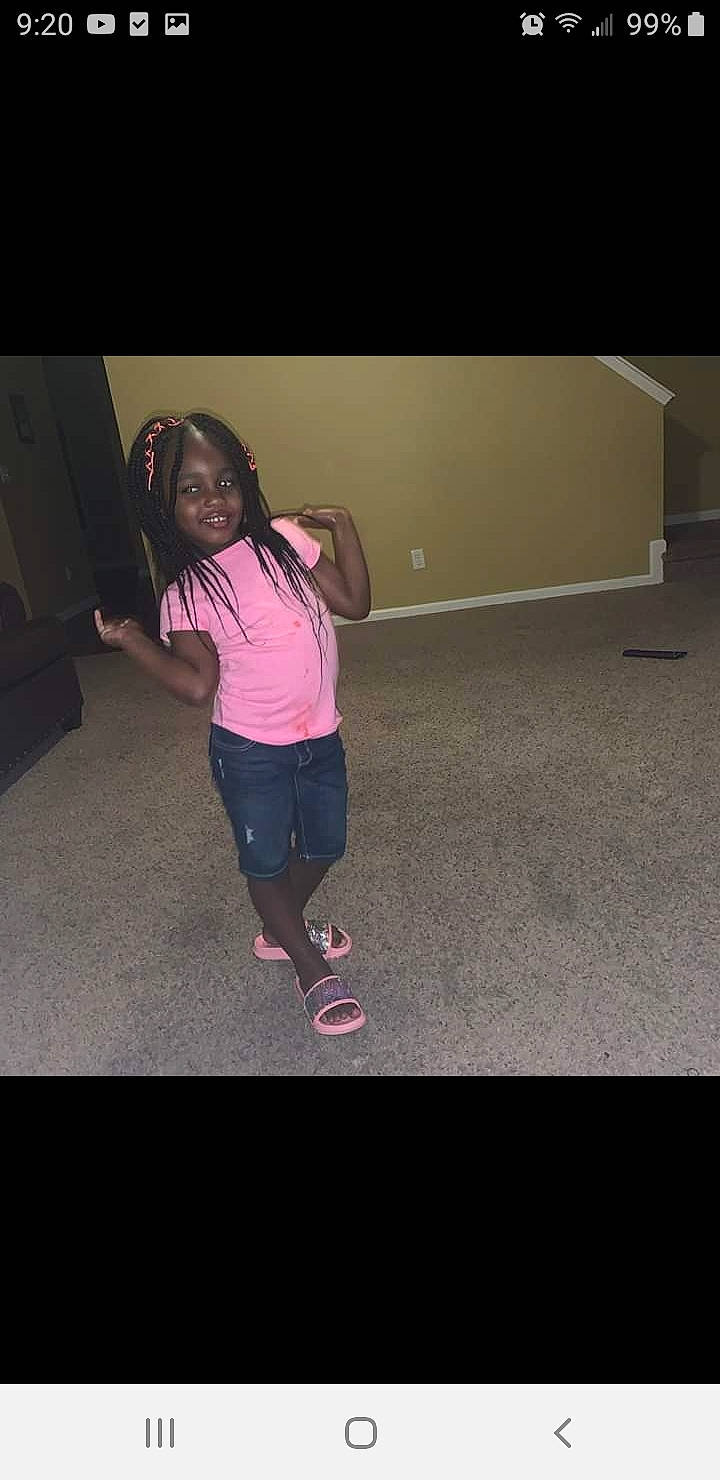 Cassidy is registered to the contest to win money with this photo: arm, child, floor, footwear, fun, hip, human_body, human_leg, joint, joy, knee, leg, person, photography, pink, shoe, shoulder, smile, snapshot, standing