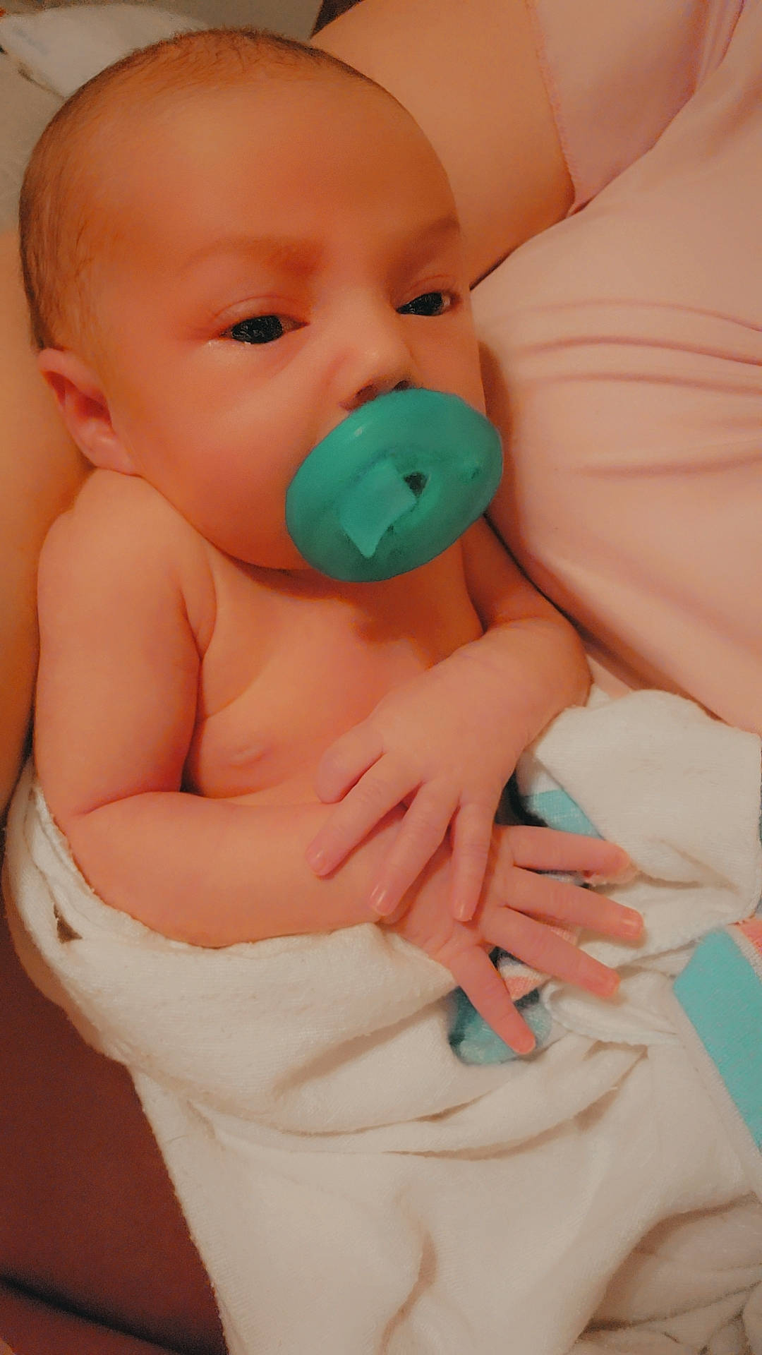 Onyx is registered to the contest to win money with this photo: abdomen, aqua, arm, baby, baby_grabbing_for_something, baby_toddler_clothing, cheek, chest, comfort, finger, gesture, hand, happy, mouth, neck, nose, person, skin, stomach, thumb