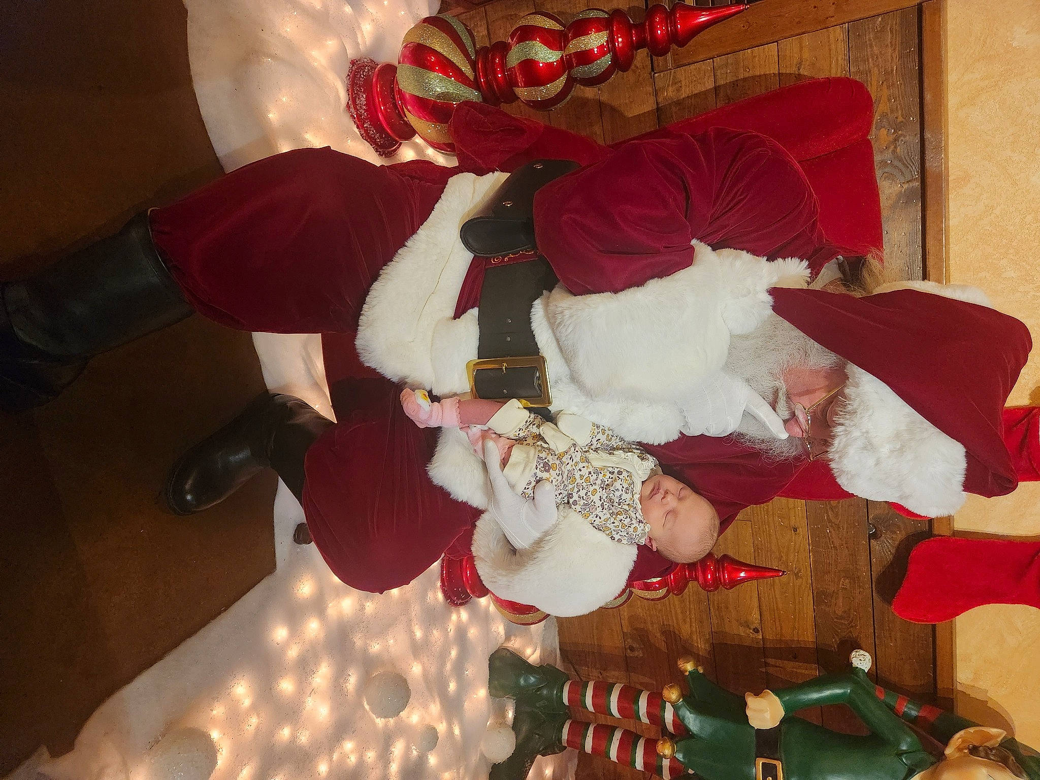 Onyx joined the competition — help win amazing prizes! carmine, christmas, christmas_decoration, christmas_eve, christmas_ornament, christmas_tree, comfort, costume_hat, decoration, event, fictional_character, holiday, holiday_ornament, interior_design, lap, ornament, person, room, santa_claus, tradition