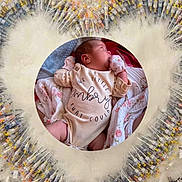 Sophia joined the competition — help win amazing prizes! arrangement, baby, blanket, colorful, contrast, cute, face, healthcare, heart_shape, infant, medical, medicine, newborn, onesie, peaceful, portrait, sleeping, soft, syringes, vials
