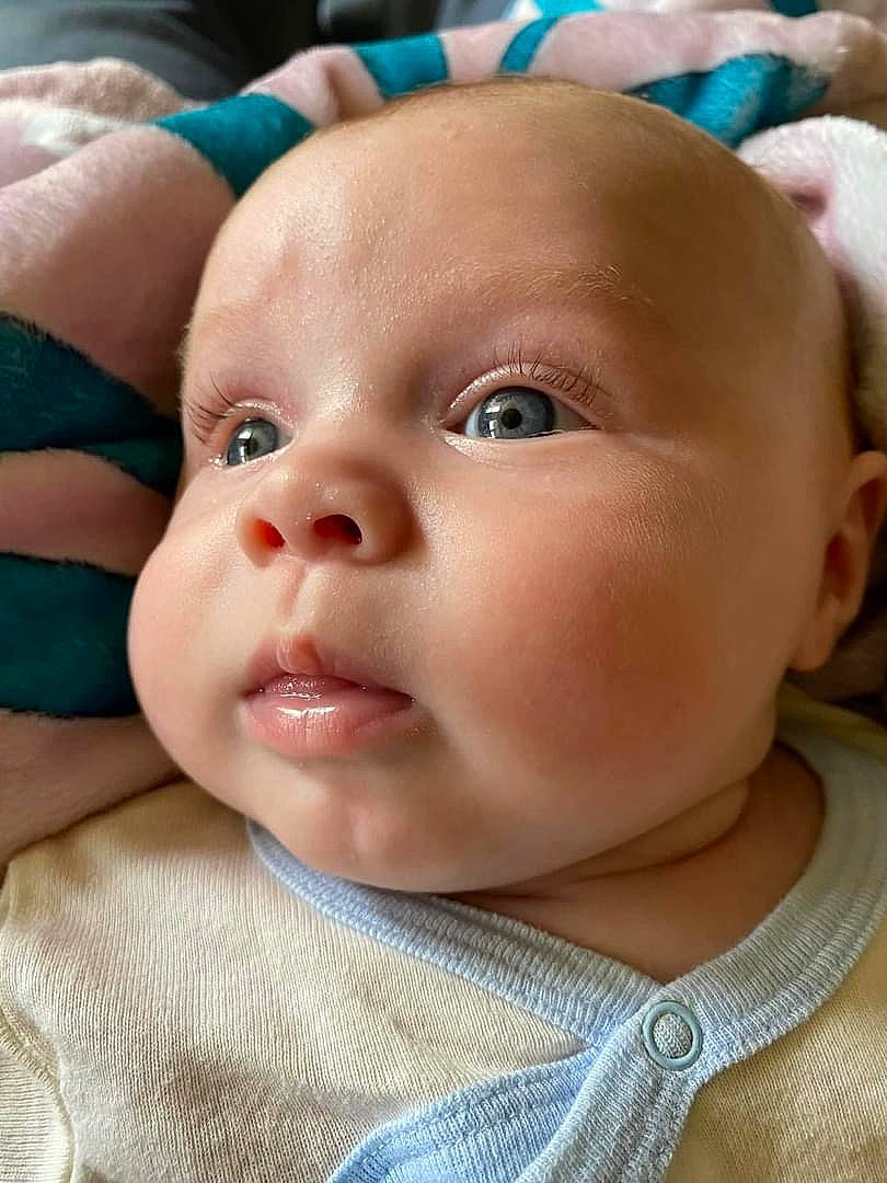 Korbyn is registered to the contest to win money with this photo: baby, baby_toddler_clothing, cheek, child, chin, ear, eye, eyebrow, eyelash, facial_expression, forehead, grass, happy, headgear, iris, lip, mouth, nose, person, skin