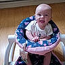 Roselynn joined the competition — help win amazing prizes! baby, smiling, baby_walker, floor, wooden_floor, infant, child, happy, sitting, toy, clothing, indoor, person, face, cute, bright, colorful, pattern, young, playful
