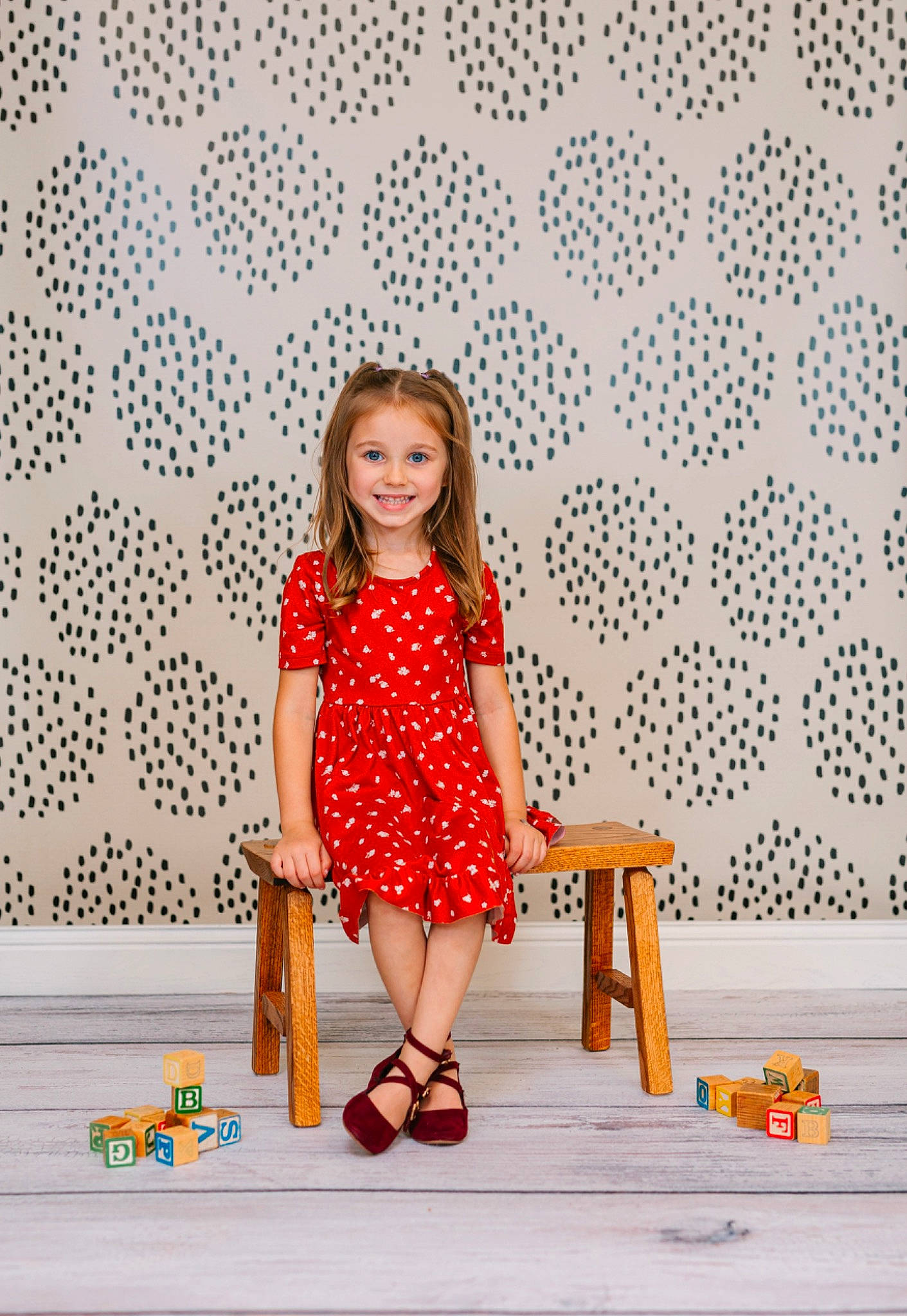 Stella is registered to the contest to win money with this photo: day_dress, dress, fashion_design, flooring, happy, human_leg, joy, leg, leisure, magenta, orange, pattern, peach, person, pink, sitting, sleeve, smile, textile, thigh