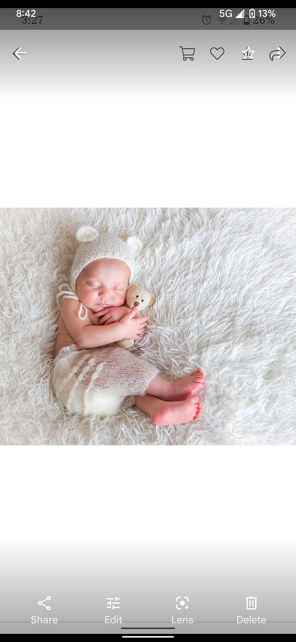 Kristian joined the competition — help win amazing prizes! baby, baby_toddler_clothing, child, comfort, fashion_accessory, flooring, font, fur, grey, happy, headgear, linens, pattern, person, product, sitting, skin, sleeve, textile, toddler