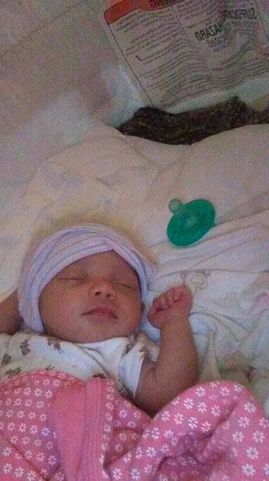 Macey joined the competition — help win amazing prizes! baby, baby_products, baby_sleeping, baby_toddler_clothing, beanie, bed, bedding, bedtime, cheek, child, comfort, headwear, linens, nap, person, pink, room, skin, sleep, textile