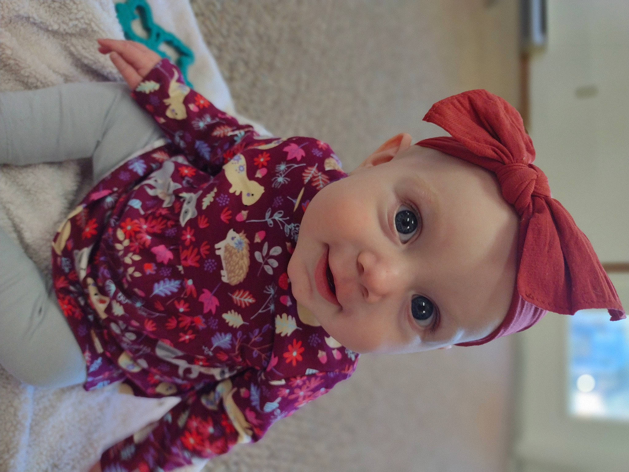 Elaina is registered to the contest to win money with this photo: dress, eye, eyelash, hair, hair_accessory, happy, human_body, iris, lip, magenta, neck, pattern, person, pink, plant, purple, toddler, toy, tradition, tree