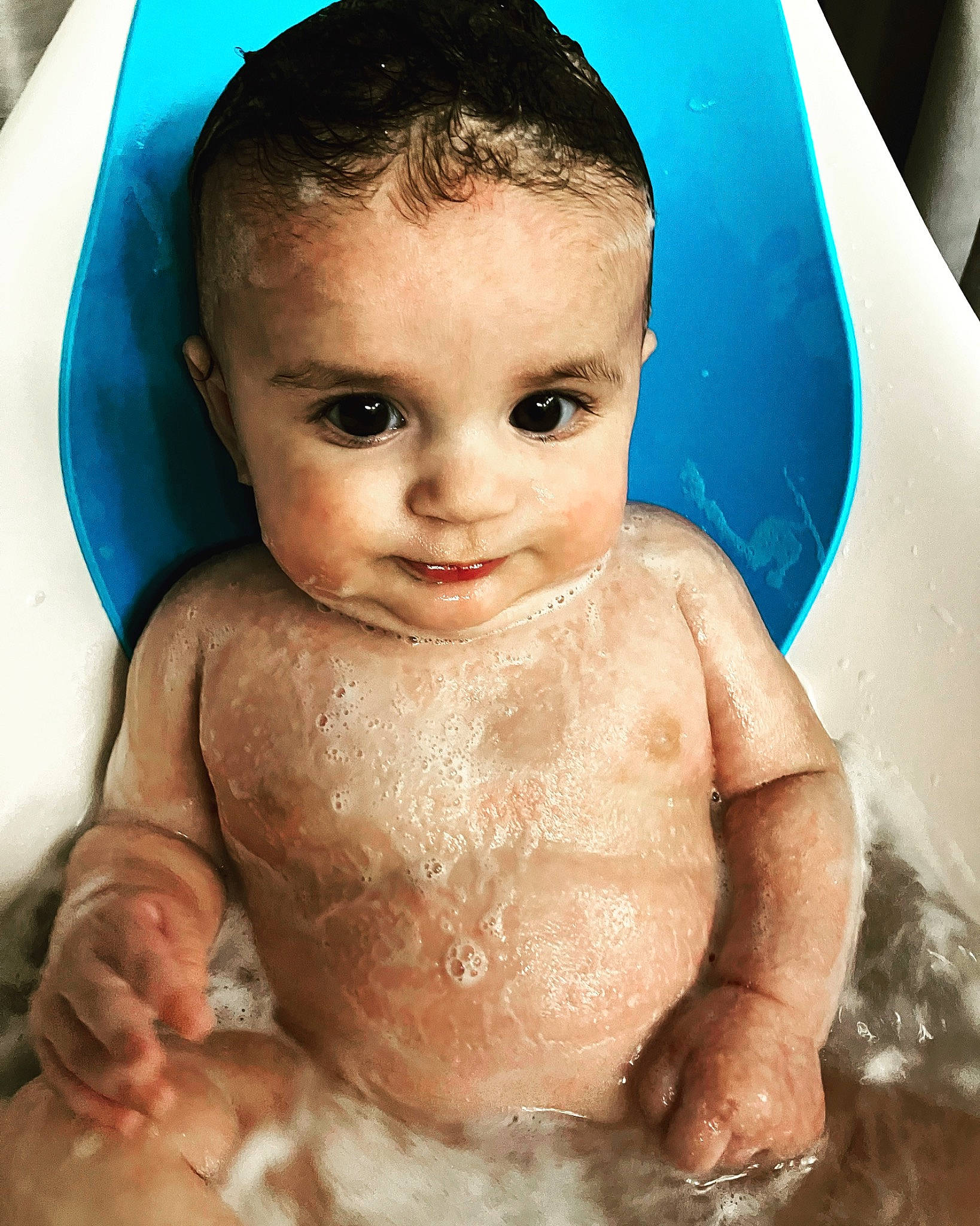 Flora joined the competition — help win amazing prizes! arm, baby_bathing, blue, cheek, chin, eye, face, facial_expression, fluid, hair, hairstyle, hand, head, human_body, mouth, nose, organ, person, product, skin