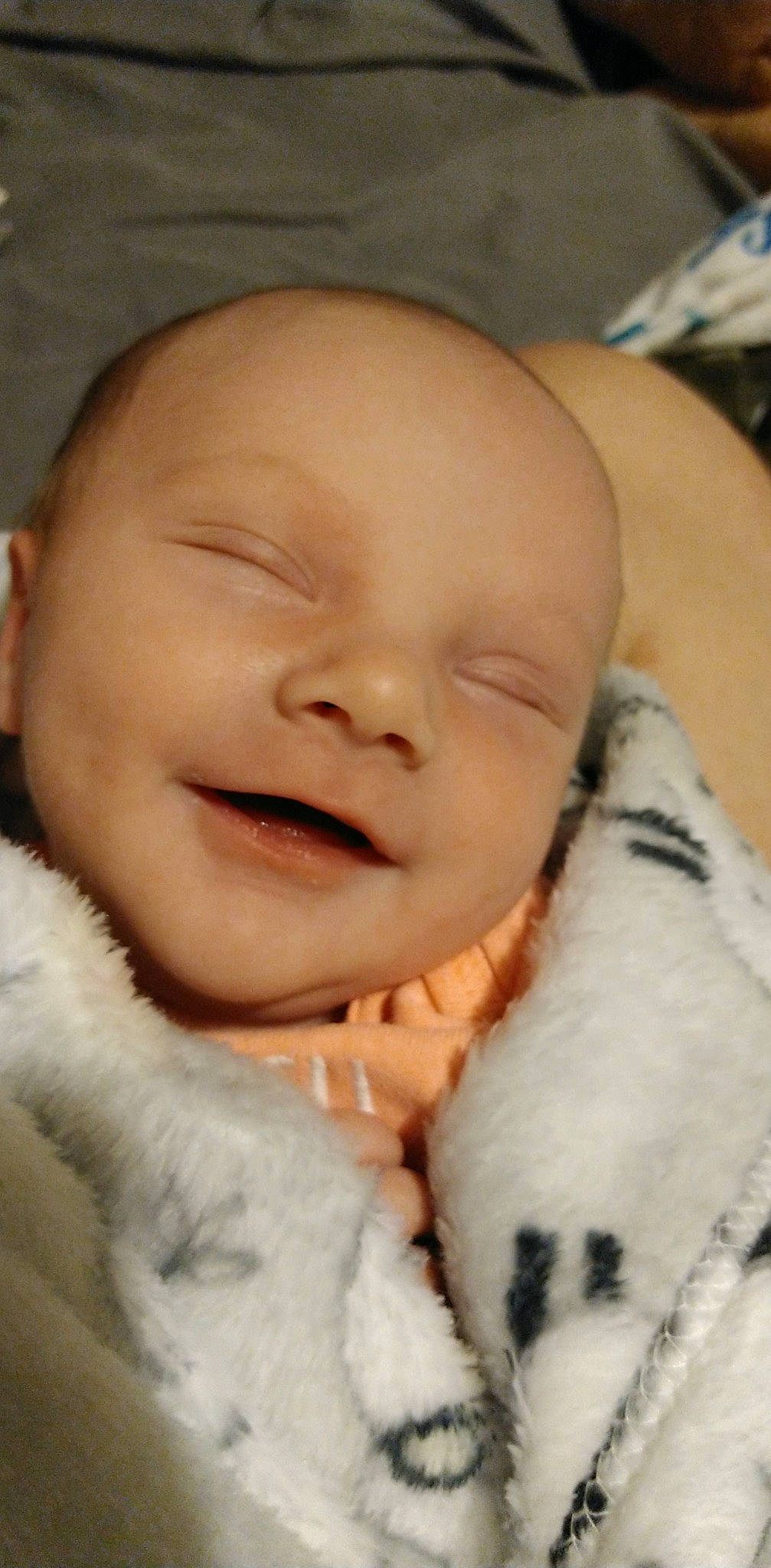 Joshua is registered to the contest to win money with this photo: baby, baby_toddler_clothing, cheek, chin, comfort, ear, eye, eyebrow, facial_expression, flash_photography, happy, hat, iris, lip, mammal, mouth, nose, person, skin, smile