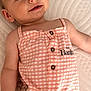 Lilyrose a rejoint le concours — aidez-le/la à gagner de superbes lots ! baby, child, infant, face, smile, clothing, peach, checkered, bambi, cartoon, quilted, bed, lying_down, cute, eyes, skin, button, sleeveless, person, portrait